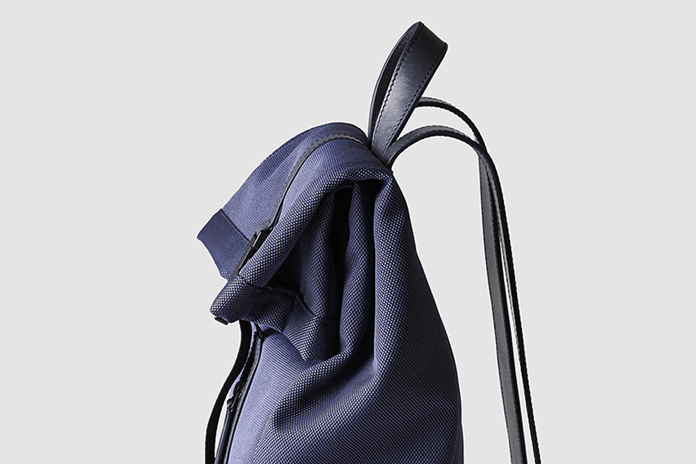 A navy blue business backpack